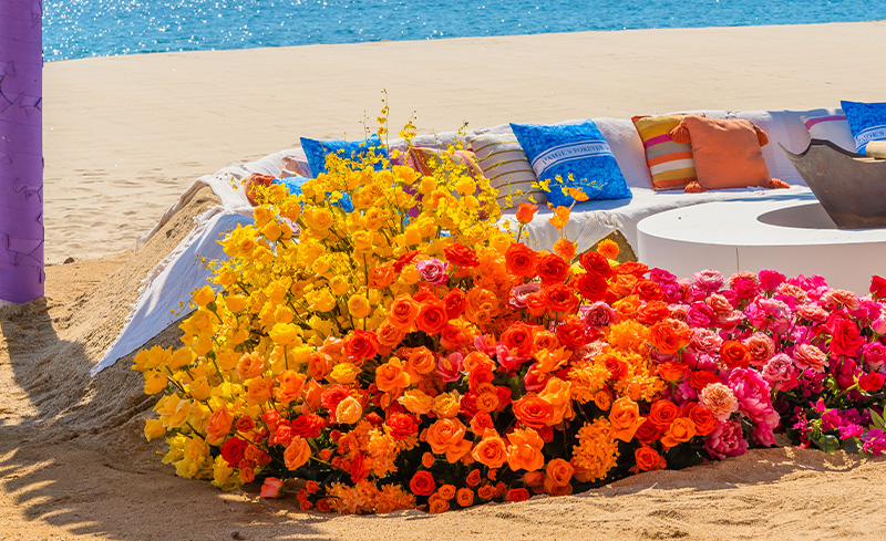 Bright florals on the beach for party
